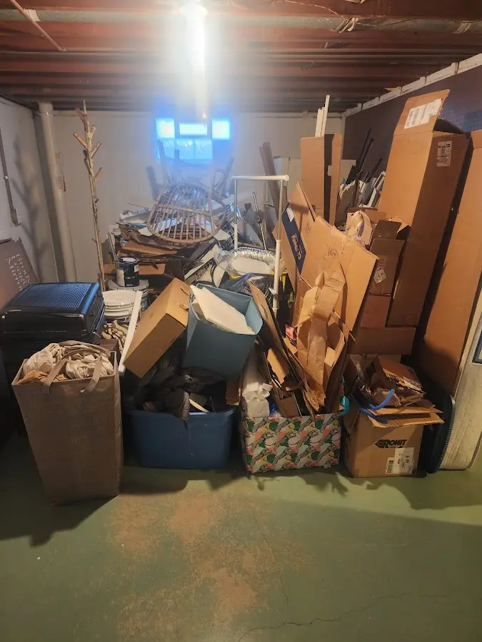 Roll-off dumpster container at job site for Yard Waste Dumpster Rental in Sherrelwood